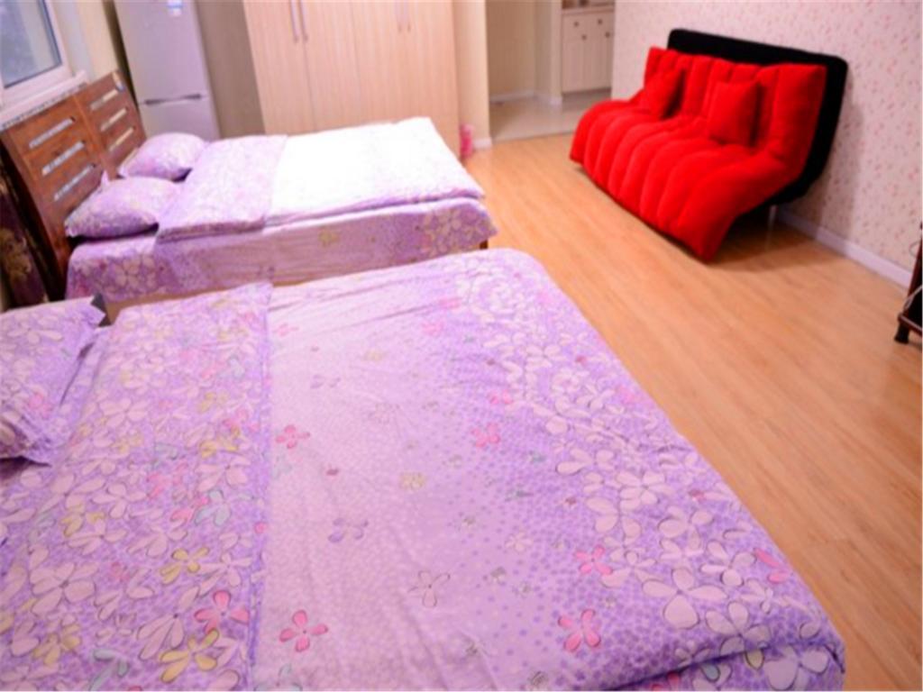 Green Express Apartment Harbin West Railway Station هاربين المظهر الخارجي الصورة